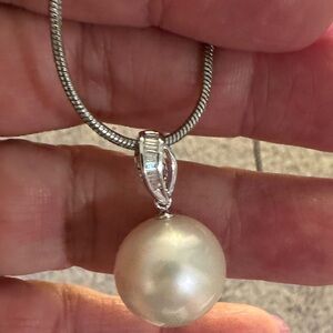 SOLDSouth sea Pearl Pendant 15mm set in 14kt Gold with Natural diamonds.
